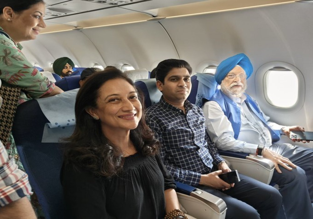 I've been travelling so often these days that aircraft feel like a home away from home!   With fellow passengers on my way back from Chandigarh today.